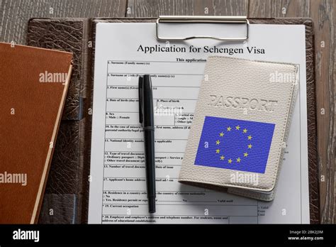 Application Form Pen And European Union Passport Stock Photo Alamy