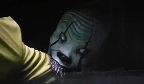 pennywise the dancing clown eating georgie s arm confusing movies doom 2 film theory