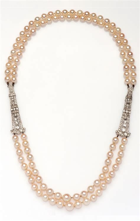 An Art Deco Cultured Pearl Necklace With Platinum And Diamond Links Circa Artdeco