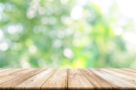 Premium Photo Empty Wooden Table Top With Blurred Green Garden