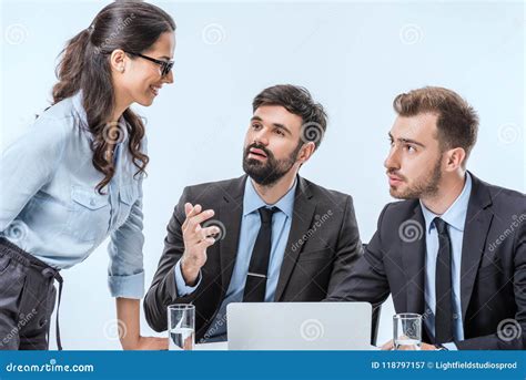 Young Business People Having Discussion While Stock Image Image Of