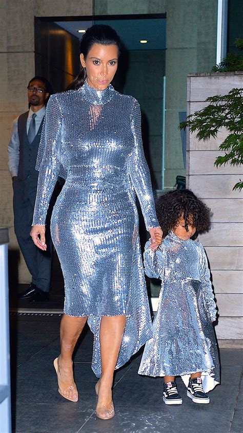 Kim Kardashian Goes Braless In Bizarre Metallic Outfit Aol Entertainment
