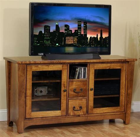 Watch this video to find out! Urban Shaker Flat Screen TV Stand from DutchCrafters
