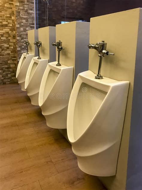 White Men S Urinals Lined In A Toilet Stock Image Image Of Indoor