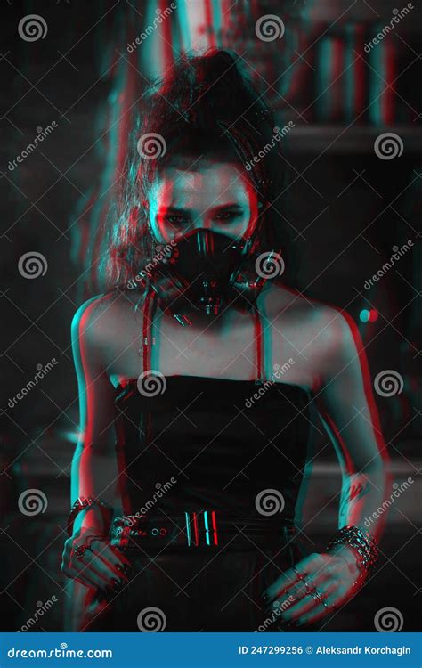 girl in a cyberpunk costume in a gas mask cosplays a character of a future cyborg computer game