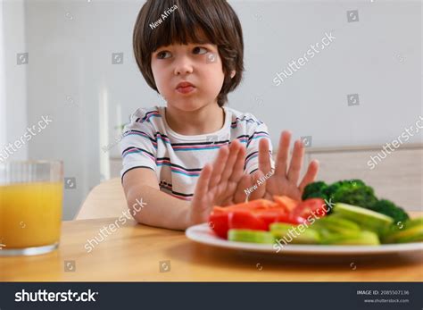 Cute Little Boy Refusing Eat Vegetables Stock Photo 2085507136