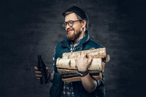 Free Photo A Drunk Bearded Male Dressed In Fleece Shirt Holds