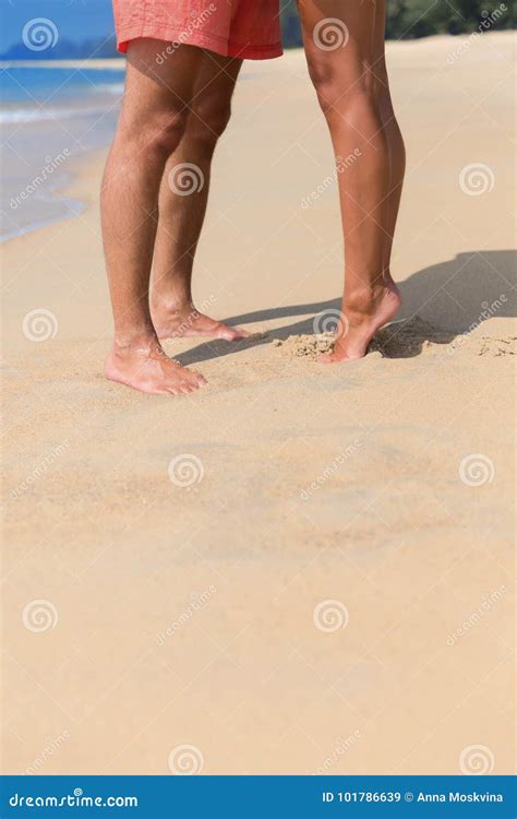 legs of a kissing couple on a sea beach stock image image of legs love 101786639
