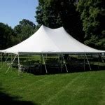 Our specialty is tented events. 30′ x 40′ w/ Round Tables & Dance Floor - Super Stuff Party Rental
