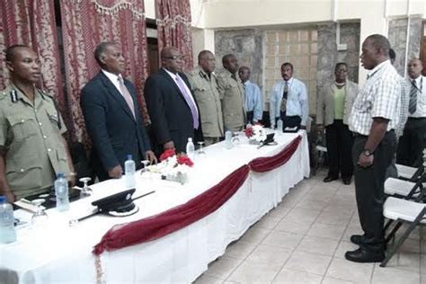premier of nevis and prime minister of skn meet with police officers on nevis ziz broadcasting