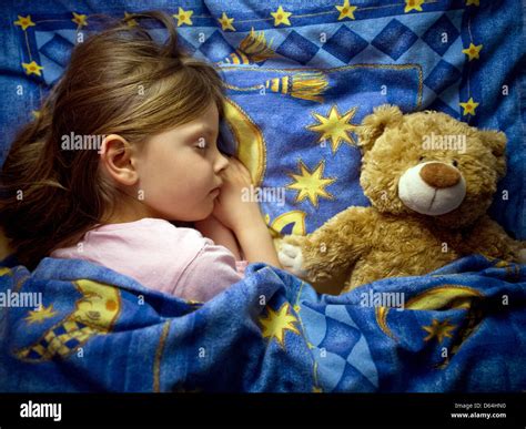 The Illustration Shows 6 Year Old Amy Sleeping In Her Bed Next To Her