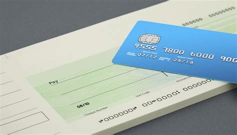 Learn how to add funds to your payment account with a cheque. 42733893 - cheque book and bank card - Bit Mascot