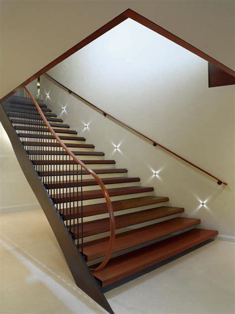 The shadow gap technique has been expanded and developed on minimalist staircase. 15 Modern Staircases with Spectacular Lighting