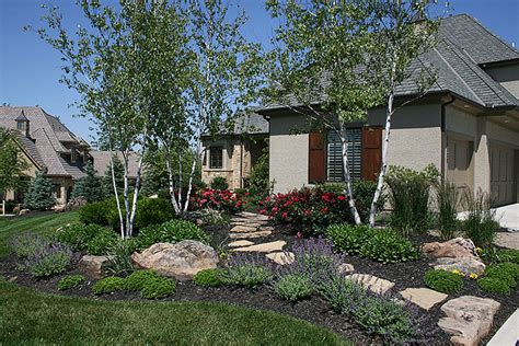 There are many different ideas that can be used to transform your lawn into something better than the type of landscaping around a tree that you will do is going to depend on what you have available to you. Landscaing, Landscape Design, Natural Stone, Lenexa ...
