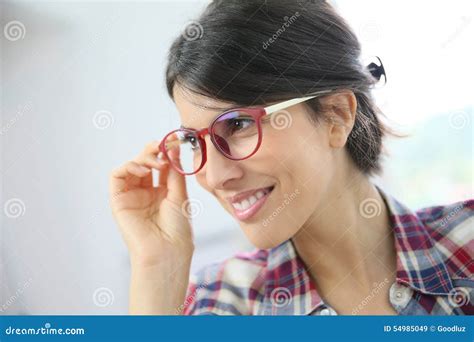Profile Portrait Of Smiling Young Woman Wearing Eyeglasses Stock Image