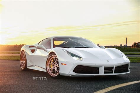 The 488 ushered in a new age for ferrari when the turbocharged 488 gtb replaced the naturally aspirated 458. White Ferrari 488 Stands Out with Rose Gold Strasse Wheels on | Gold wheels, White car