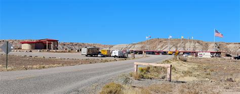 Looking for the scripts matching the four corners of nowhere? Standing on Four States at Four Corners Monument - The ...