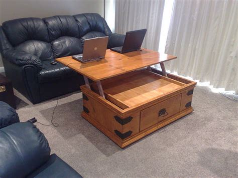 The most common coffee table desk material is wood. It Looks Like A Simple Coffee Table, But Wait Until You ...