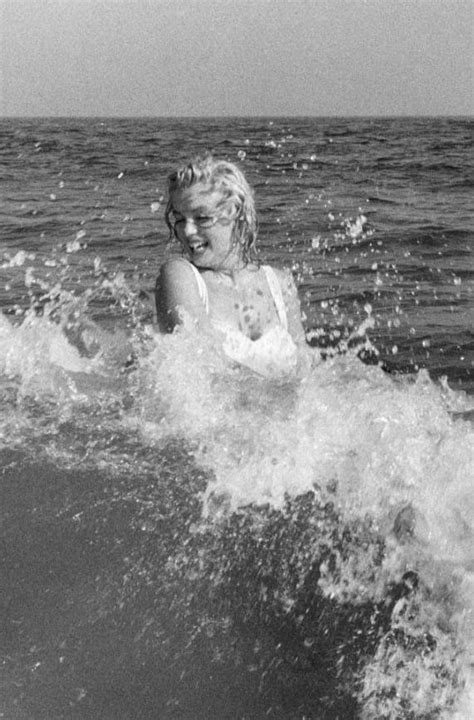Rare Candid Photo Of Marilyn Monroe Playing In The Beach Water