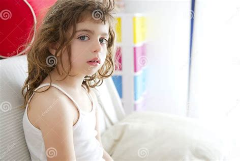 Little Brunette Girl Sit On Sofa Window Light Stock Image Image Of Girl Innocence 14656109