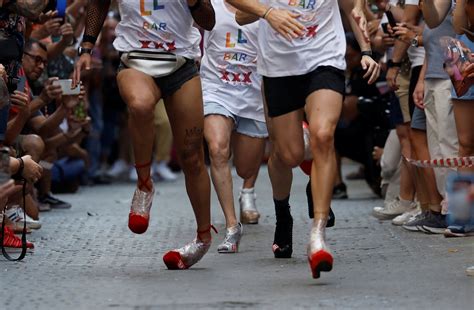 ready try to stay steady go men in high heels race at madrid pride reuters