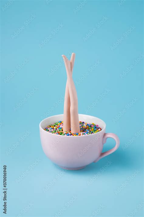 Blonde Doll Put Upside Down In A Mug Full Of Candies Cake Decoration