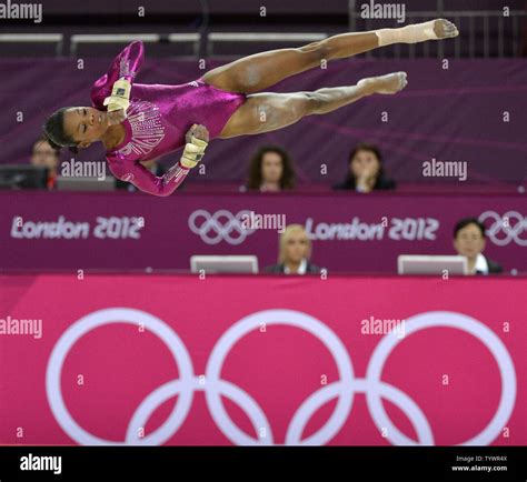 American Gymnast Gabrielle Douglas Is Airborne As She Goes Through Her