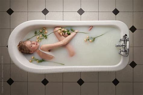 Girl Taking Milk Bath Directly Above View Of Attractive Blond Woman