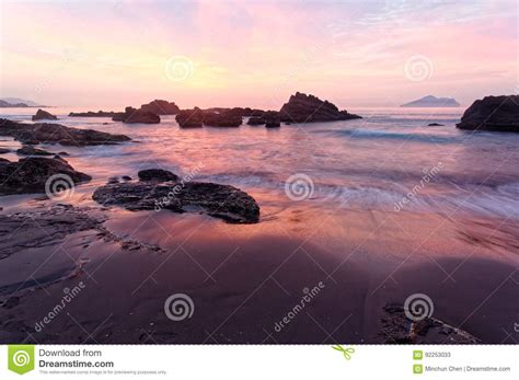 Beautiful Sunrise Scenery Of A Rocky Beach In Northern Taiwan Stock