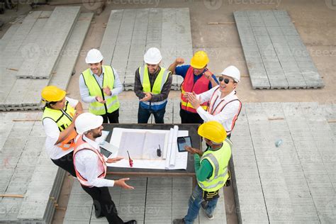 Construction Engineers Architects And Foremen Form A Group