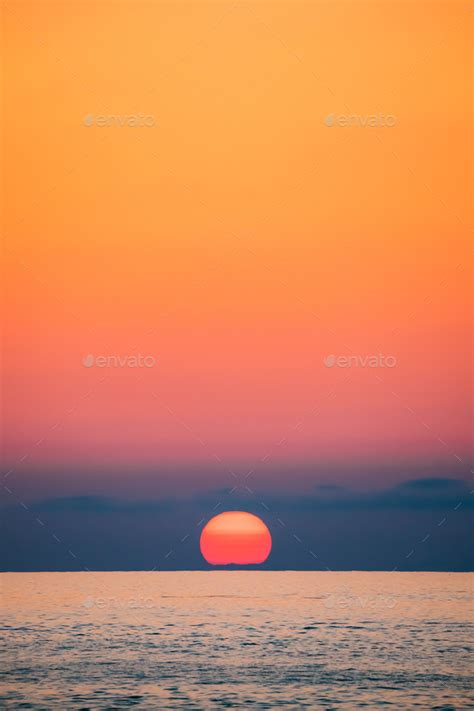 Sundown Above Sea Horizon At Sunset Natural Sunrise Sky Warm Co Stock