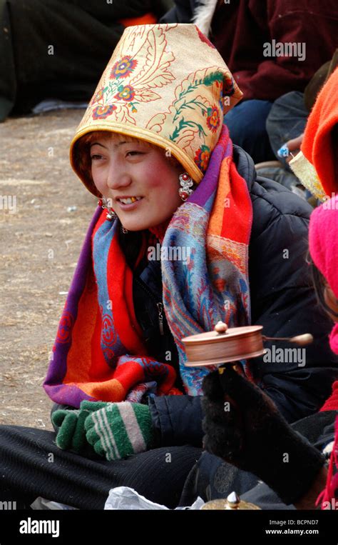 tibetan woman with golden silk hat garzê tibetan autonomous prefecture sichuan province china