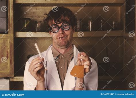 Creepy Scientist Weird Portrait In His Laboratory Royalty Free Stock Image