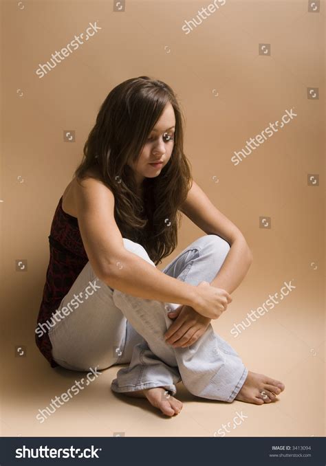 Teenage Girl Sitting Crosslegged Depressed State Stock Photo 3413094