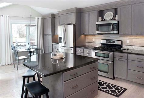 Favorite this post jun 30 A kitchen remodel in North Wales, Pennsylvania features gray cabinetry, stainless steel ...