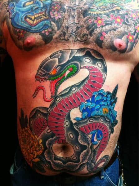 Some of these are designed specifically for this area. Stomach Tattoos for Men - Ideas and Inspiration for Guys