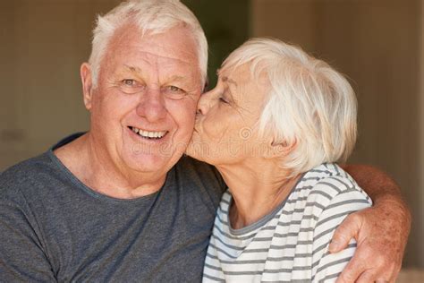 Senior Woman Kissing Her Smiling Husband Morning Stock Photos Free