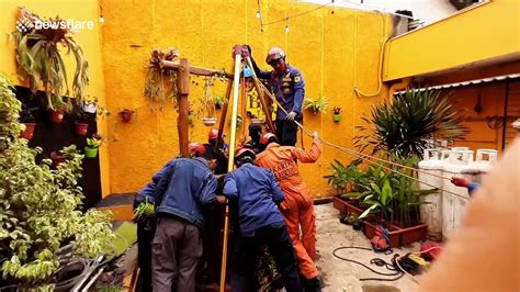 Firefighters rescue two children, one adult from well in Indonesia