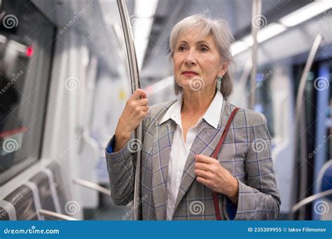 mature woman standing in subway train stock image image of russian 6065 235309955