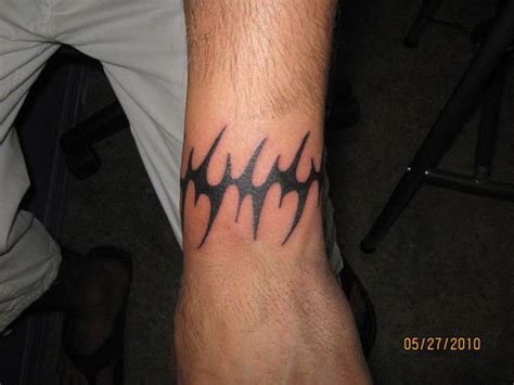 Among these styles two were very popular candles and group of sticks. 41 All Around Wrist Tattoos