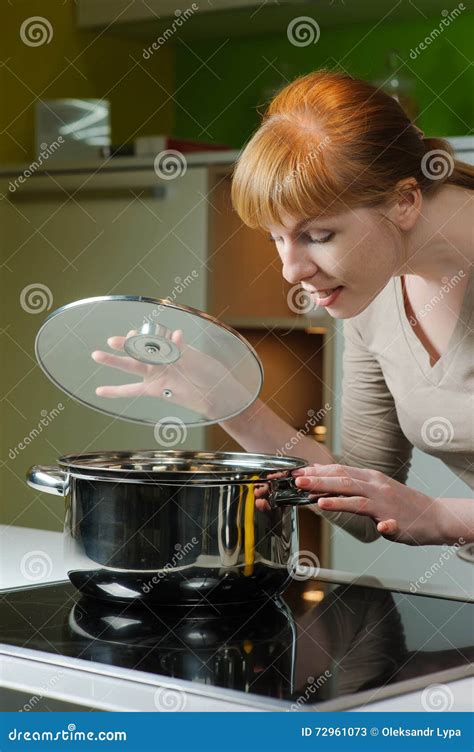 Young Woman In The Kitchen Stock Image Image Of Hold 72961073