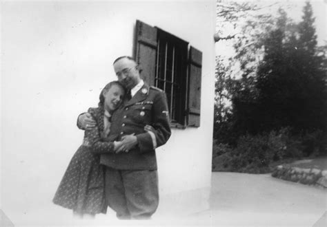 Like many others, they had taken out war loans. Reichsfuehrer-SS Heinrich Himmler embraces his daughter ...