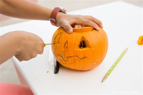 How To Carve A Pumpkin With Kids Step By Step Fun With Mama