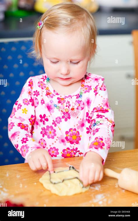 Little Girl Baking Cookies Stock Photo Alamy