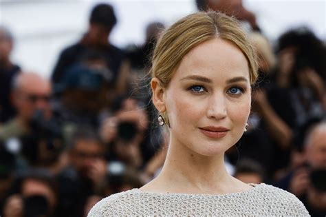 Unveiling the Alluring Charisma of Jennifer Lawrence: An Enchanting