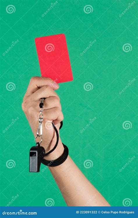 Referees Hand Holding A Red Card Stock Photo Image Of Showing Green