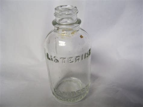 Vintage listerine glass bottle 3 fluid ounces labels both sides new unopened. Vintage Listerine Lambert Pharmacal Company clear glass bottle