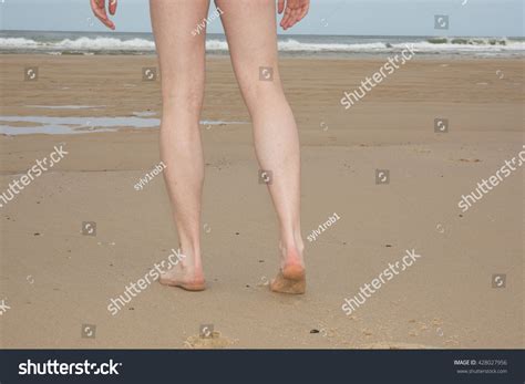 Photo De Stock Legs Man Naturist On Beach Under 428027956 Shutterstock