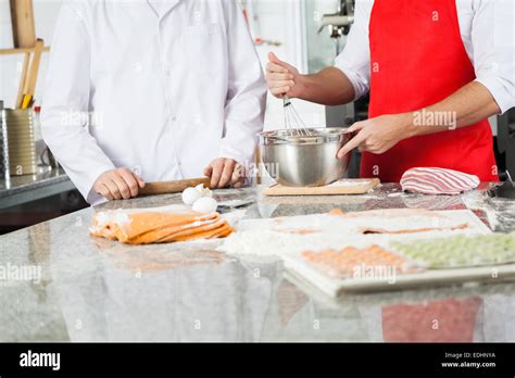 Male Chefs Preparing Ravioli Pasta At Counter Stock Photo Alamy