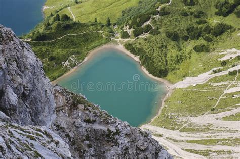 View From Lachenspitze Peak Towards A Turquoise Mountain Lake And